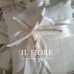 Cuscino portafedi con stella marina