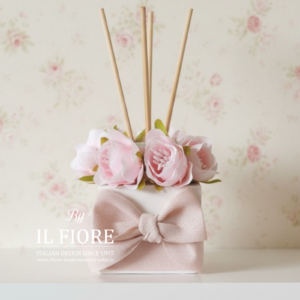 bomboniera battesimo profumatore in gesso con fiori bimba e bimbo