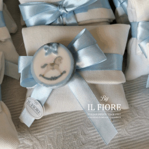 Bomboniere Battesimo bimbo/bimba sacchetto con calamita cavalluccio a dondolo