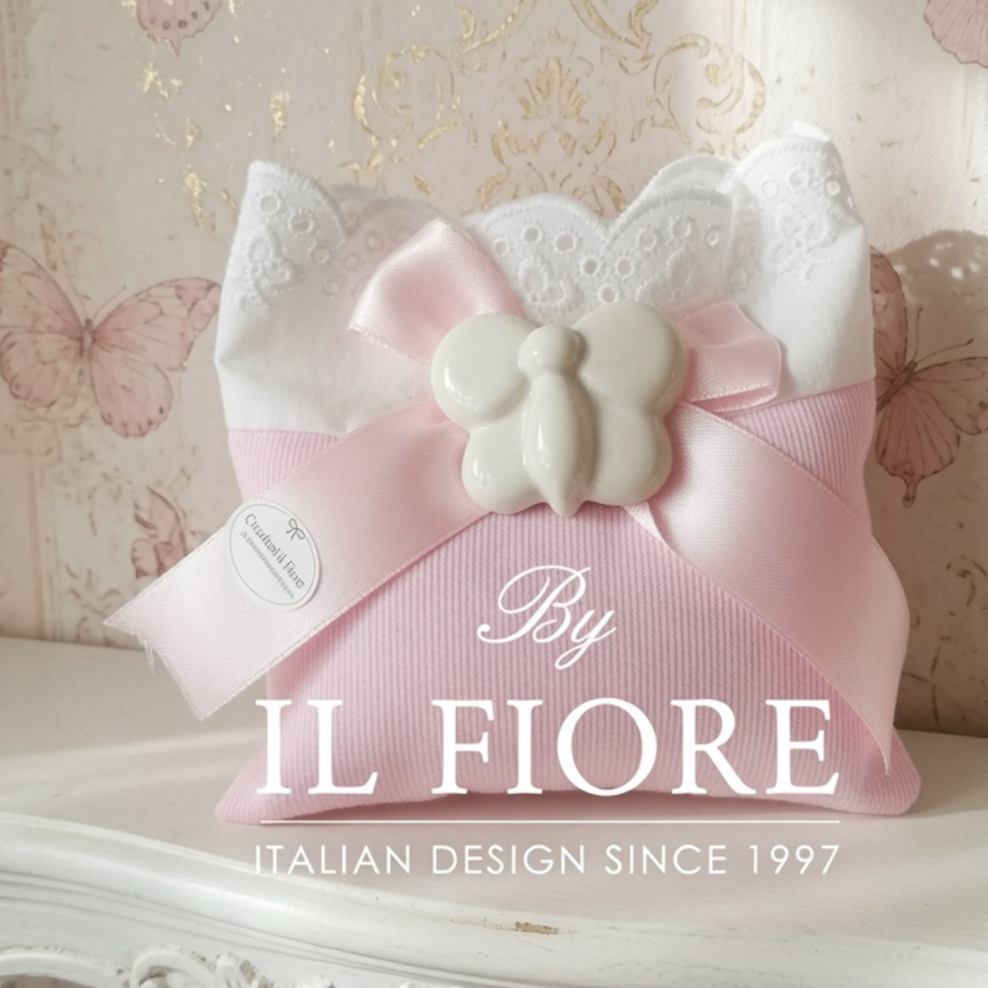 bomboniera battesimo bimba sacchetto portaconfetti con farfalla in gesso e calamita.